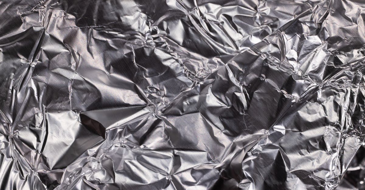 How do I remove aluminum foil from the bottom of my oven? - Woman Preparing Dinner