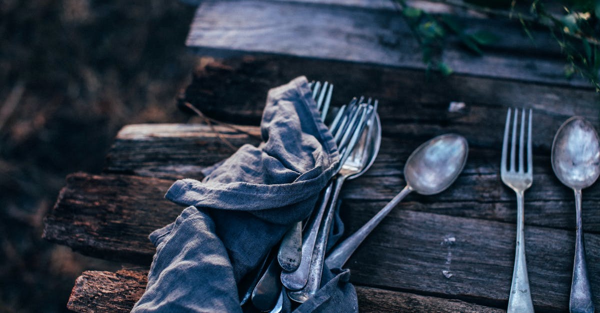 How do I remove boar taint (from a wooden handle)? - High angle of spoons with forks near crumpled textile on rustic table in garden on sunny day How do I remove boar taint (from a wooden handle)? - High angle of spoons with forks near crumpled textile on rustic table in garden on sunny day