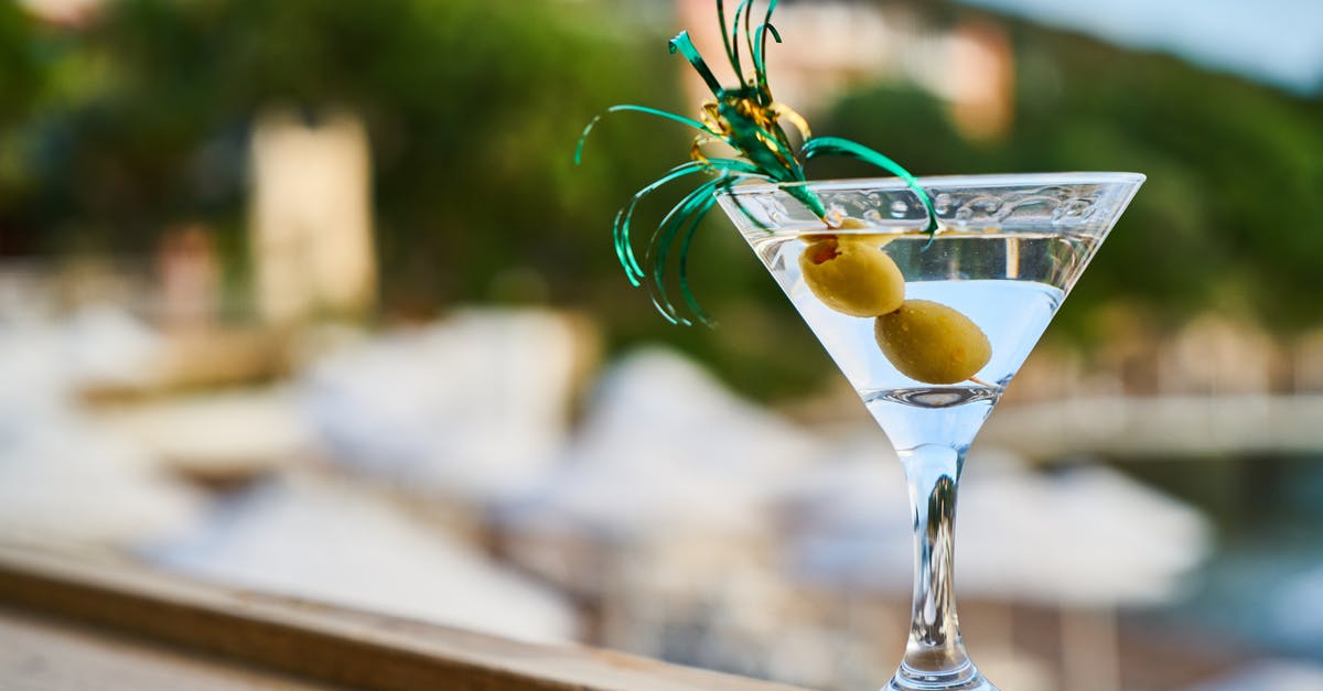 How do i select a gin to use in making sloe gin? [closed] - Close-Up Photo of Martini With Olives