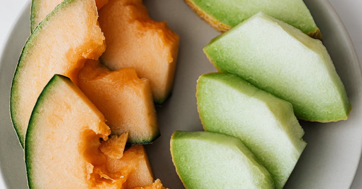 How do I tell if a cantaloupe is ripe? - Top view of ripe fresh cantaloupe and honeydew melons cut and served on plate How do I tell if a cantaloupe is ripe? - Top view of ripe fresh cantaloupe and honeydew melons cut and served on plate