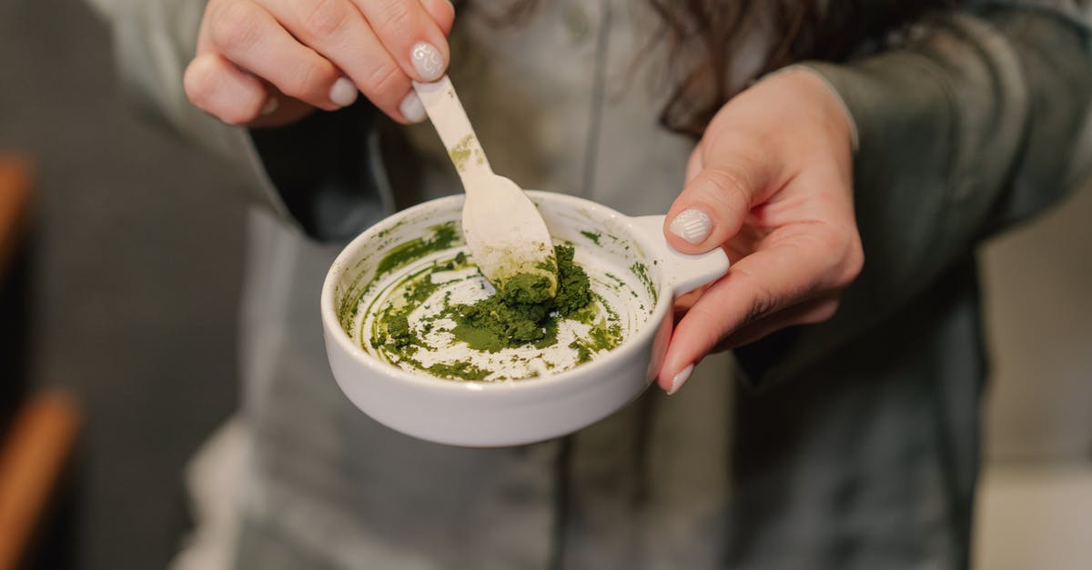 How do I time slow cooking to be ready for lunch? - Person Holding White Ceramic Cup With Green Powder How do I time slow cooking to be ready for lunch? - Person Holding White Ceramic Cup With Green Powder