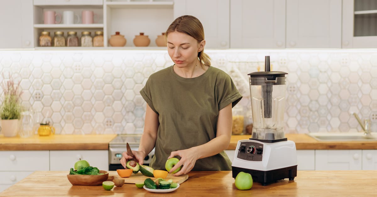 How do you bring ingredients to room temperature when its winter? - Woman in Green Crew Neck T-shirt Slicing Fruits How do you bring ingredients to room temperature when its winter? - Woman in Green Crew Neck T-shirt Slicing Fruits