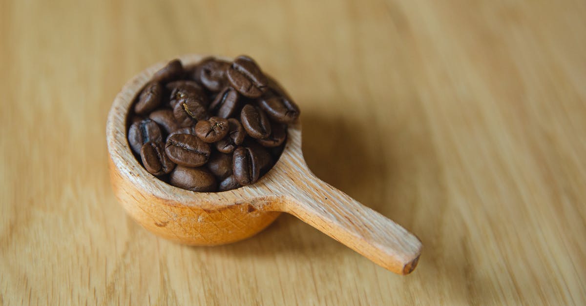 How do you clean cheesecloth full of bean roots? - Small deep spoon with coffee beans How do you clean cheesecloth full of bean roots? - Small deep spoon with coffee beans