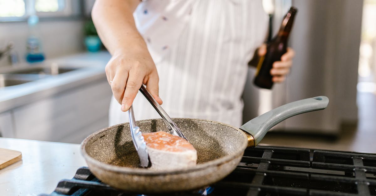 How do you fry a fat, uneven salmon filet? - Chef Cooking Salmon in Frying Pan How do you fry a fat, uneven salmon filet? - Chef Cooking Salmon in Frying Pan
