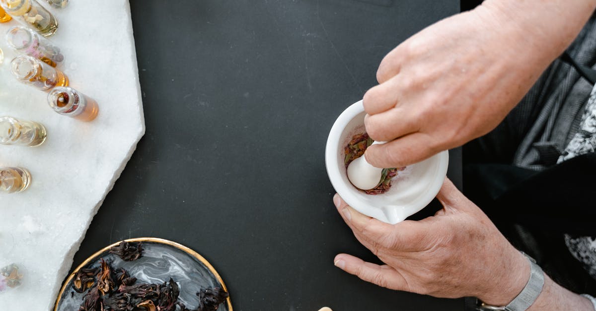 How do you get the smell of fish off your hands? - Person Holding White Ceramic Mug How do you get the smell of fish off your hands? - Person Holding White Ceramic Mug