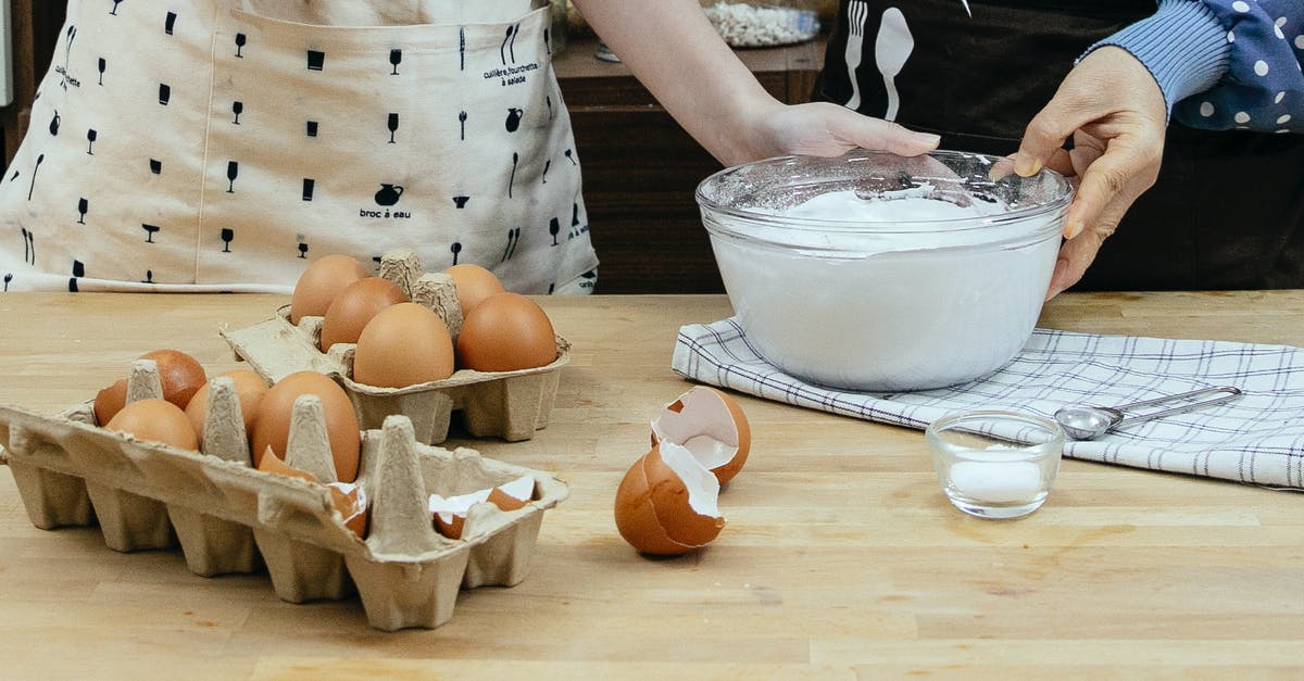 How do you shell groundnuts (peanuts) without breaking their kernels? - Crop faceless women with bowl of whipped cream baking together How do you shell groundnuts (peanuts) without breaking their kernels? - Crop faceless women with bowl of whipped cream baking together