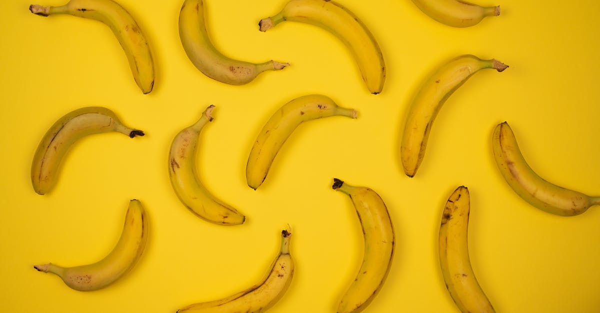 How do you stop banana flower soup from tasting astringent? - Top view of yummy ripe bananas placed at distance from each other on bright yellow background How do you stop banana flower soup from tasting astringent? - Top view of yummy ripe bananas placed at distance from each other on bright yellow background