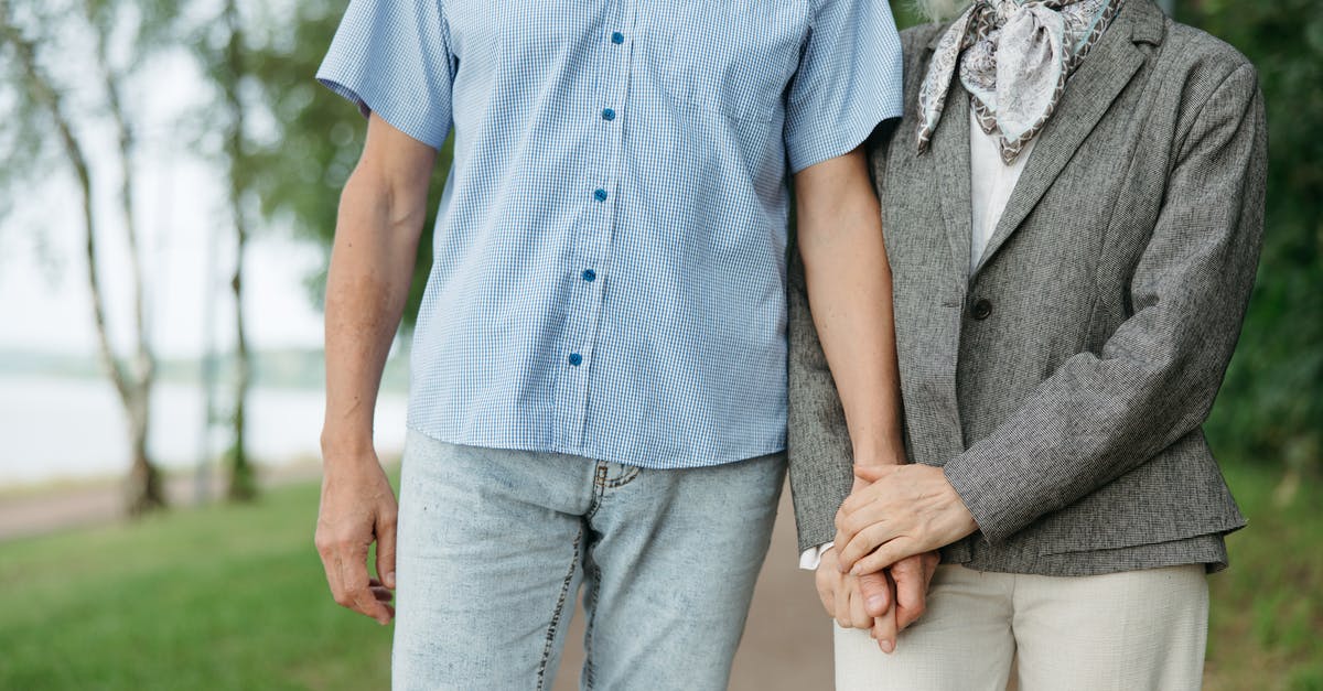 How does aging affect Gouda cheese? - Man in Blue Button Up Shirt Holding Woman in Gray Dress How does aging affect Gouda cheese? - Man in Blue Button Up Shirt Holding Woman in Gray Dress
