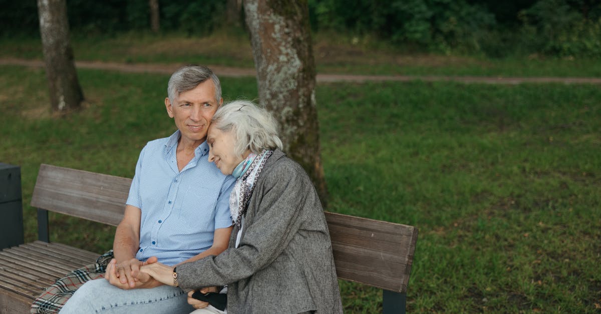 How does aging affect Gouda cheese? - Woman in Gray Long Sleeve Shirt Sitting on Brown Wooden Bench How does aging affect Gouda cheese? - Woman in Gray Long Sleeve Shirt Sitting on Brown Wooden Bench