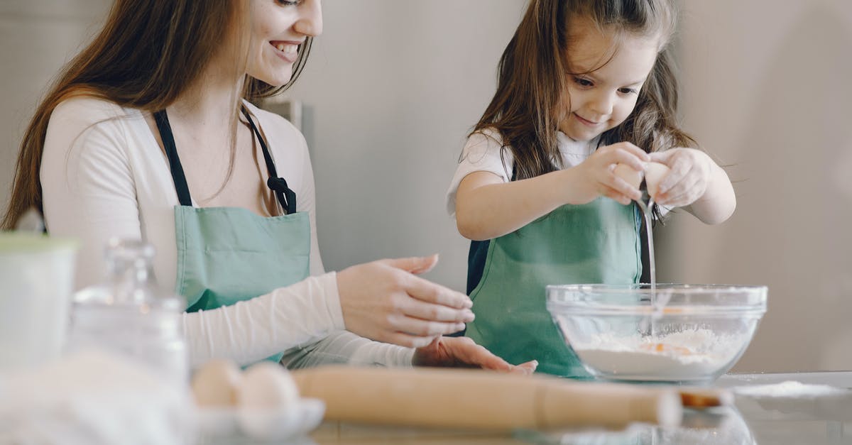 How does altering the fat-to-flour ratio affect the pastry? - Photo of Mom and Child Baking With Egg and Flour How does altering the fat-to-flour ratio affect the pastry? - Photo of Mom and Child Baking With Egg and Flour