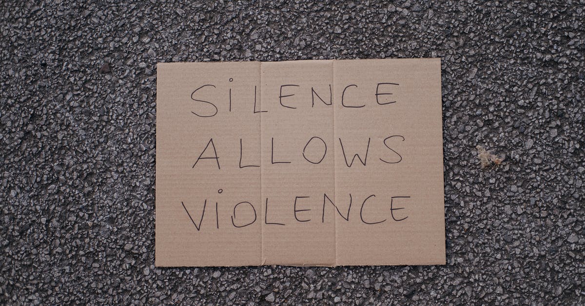 How does boiling impact the texture of tofu? - Top view of slogan silence allows violence on carton placed on rough asphalt road on street How does boiling impact the texture of tofu? - Top view of slogan silence allows violence on carton placed on rough asphalt road on street