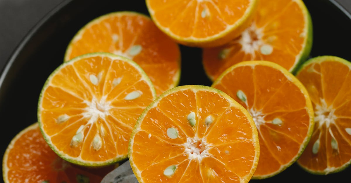 How does boiling remove vitamin C from food? - Sliced fresh juicy oranges with seeds in bowl How does boiling remove vitamin C from food? - Sliced fresh juicy oranges with seeds in bowl