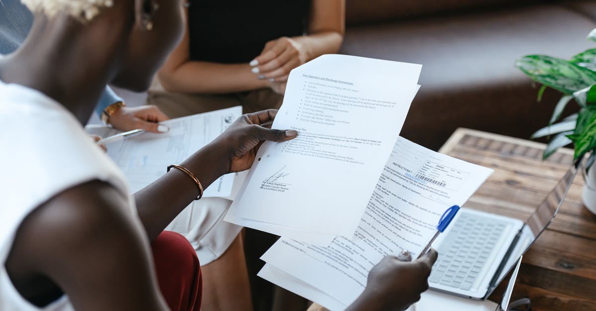 How does FPC compare to mammalian rennet? - From above of crop anonymous African American female comparing data in papers at table of office How does FPC compare to mammalian rennet? - From above of crop anonymous African American female comparing data in papers at table of office