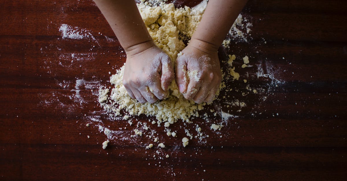 How does no-knead bread not overproof? - Person Mixing Dough How does no-knead bread not overproof? - Person Mixing Dough