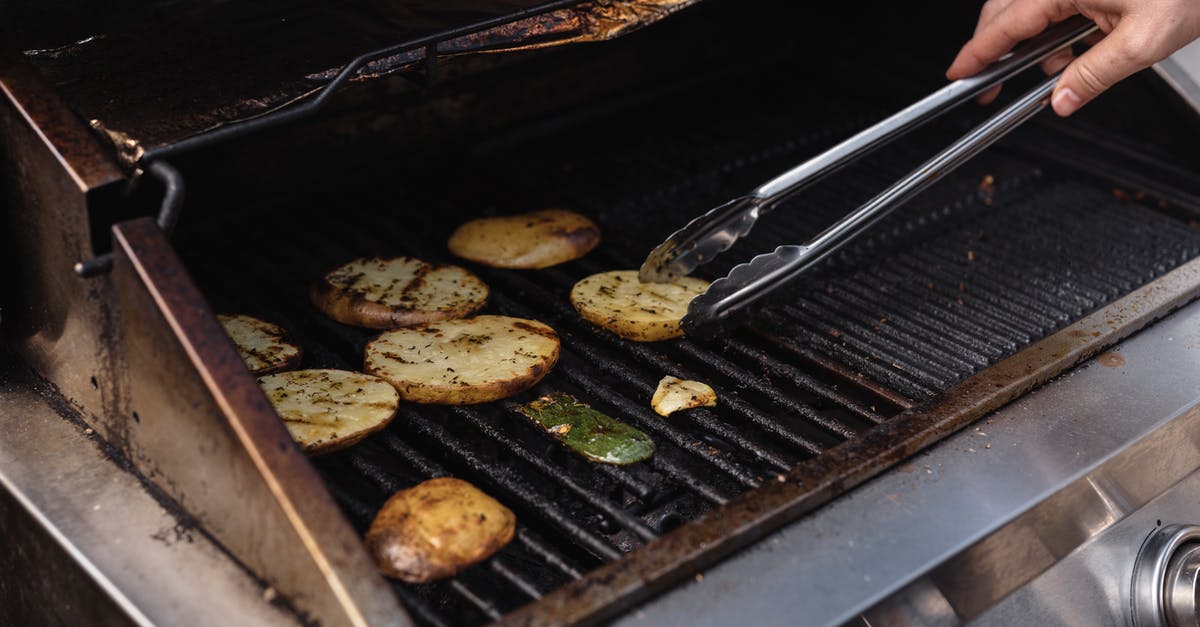 How does pH and temperature affect emulsification of vegetable oils? - Unrecognizable man with tongs turning over tasty cut potatoes on metal grate while cooking on modern hot barbecue grill machine How does pH and temperature affect emulsification of vegetable oils? - Unrecognizable man with tongs turning over tasty cut potatoes on metal grate while cooking on modern hot barbecue grill machine