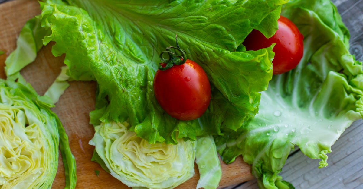 How far in advance can I prepare vegetables without it detracting from their flavour/ texture etc? - From above of assorted leaf and iceberg lettuce with ripe tomatoes arranged on wooden chopping board in kitchen in sunlight How far in advance can I prepare vegetables without it detracting from their flavour/ texture etc? - From above of assorted leaf and iceberg lettuce with ripe tomatoes arranged on wooden chopping board in kitchen in sunlight