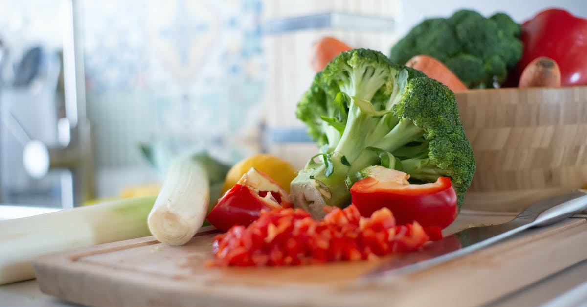 How finely chopped should vegetables be when making stock? - Chopped Red Bell Pepper on Wooden Chopping Board How finely chopped should vegetables be when making stock? - Chopped Red Bell Pepper on Wooden Chopping Board