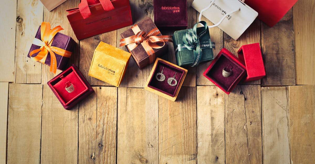 How is congee made? - Assorted Gift Boxes on Brown Wooden Floor Surface