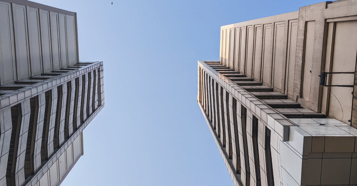 How is it that brioche rises so high? - White Concrete Building Under Blue Sky How is it that brioche rises so high? - White Concrete Building Under Blue Sky