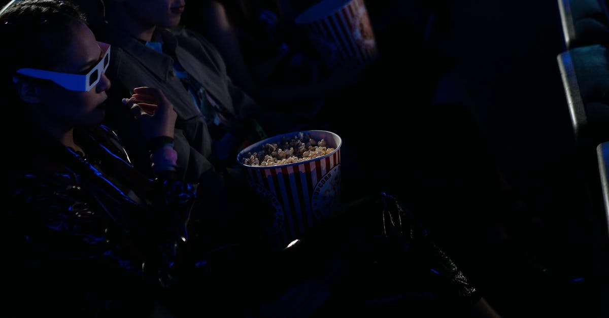 How Is Microwave Popcorn Flavoured? - Man in Black Suit Jacket Holding Cup How Is Microwave Popcorn Flavoured? - Man in Black Suit Jacket Holding Cup