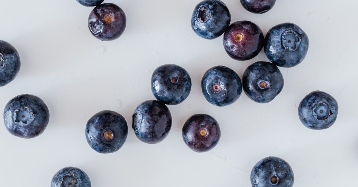 How is one meant to treat fenugreek seeds? - Top view of delicious ripe and sweet blueberry randomly scattered on white surface How is one meant to treat fenugreek seeds? - Top view of delicious ripe and sweet blueberry randomly scattered on white surface