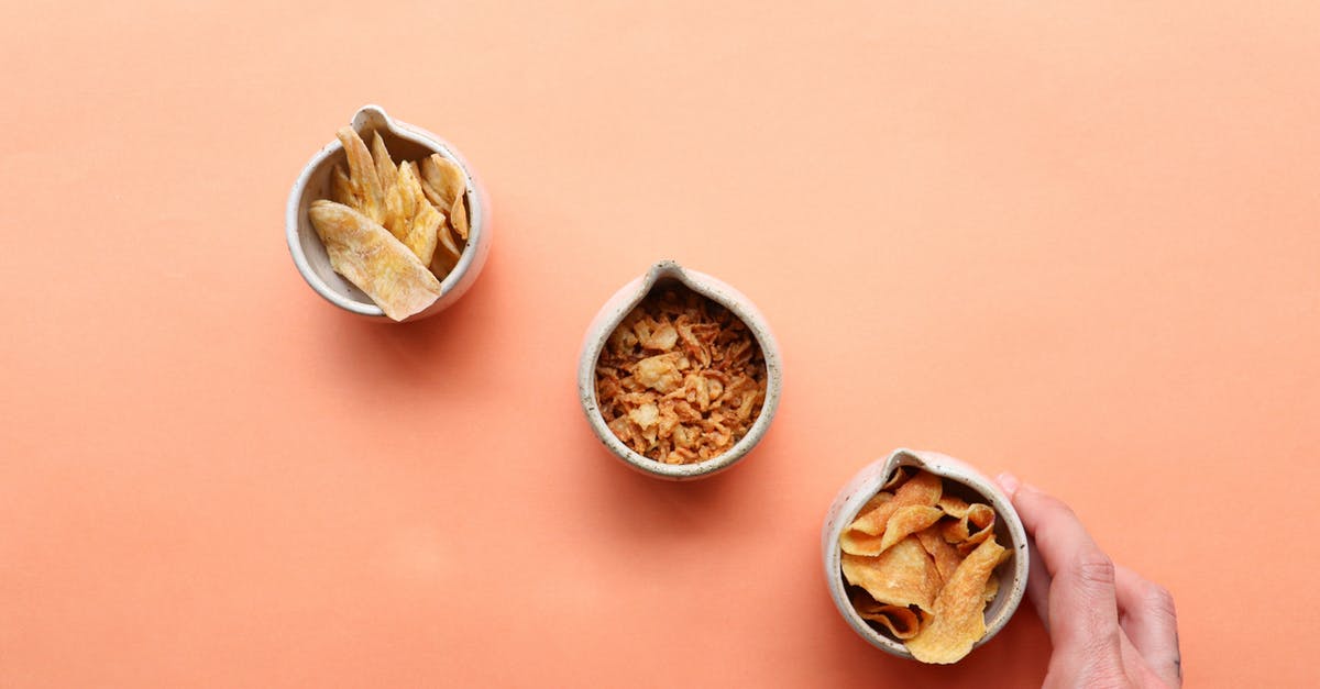 How is "nacho sliced" jalapeño different from regular sliced? - Man taking bowl of chips placed near dried fruits How is "nacho sliced" jalapeño different from regular sliced? - Man taking bowl of chips placed near dried fruits