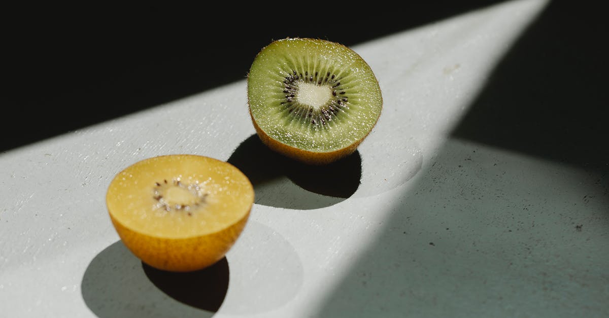 How is "nacho sliced" jalapeño different from regular sliced? - Sliced ripe green and yellow kiwi on table How is "nacho sliced" jalapeño different from regular sliced? - Sliced ripe green and yellow kiwi on table