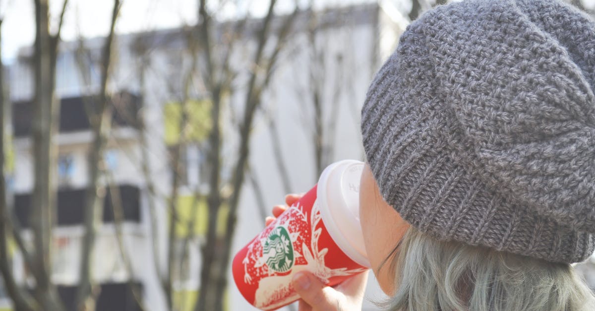 How is the chai latte in Starbucks made? - Woman Holding a cup