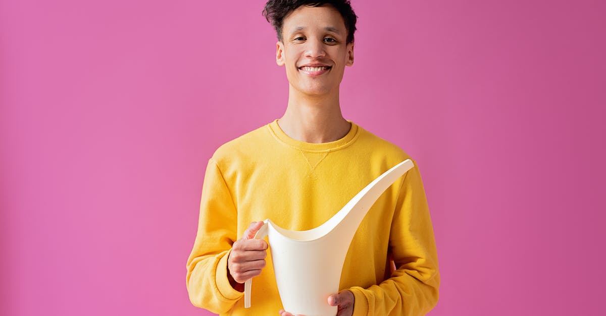 How long can melted salted caramel last? - A Handsome Young Man Holding a Long Spout Plastic Watering Can