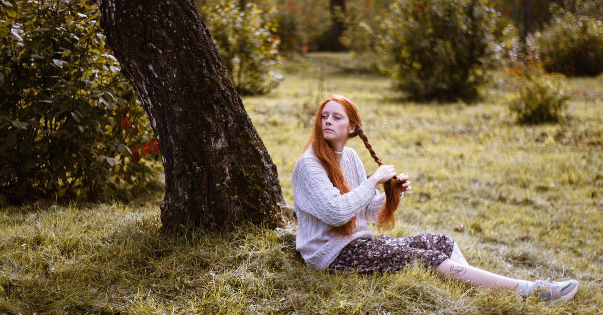 How long can oil sit for? - Woman Sitting on Green Grass Braiding Hair How long can oil sit for? - Woman Sitting on Green Grass Braiding Hair