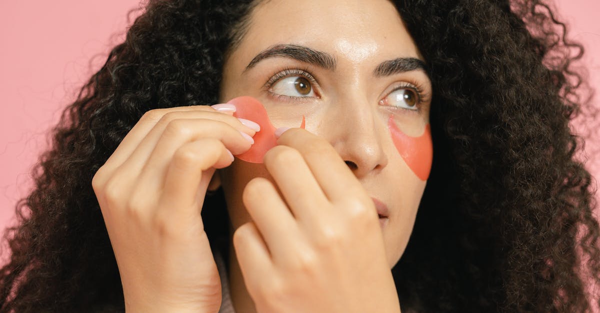 how long can you keep uncooked lentils - red and brown - Woman putting on red cosmetic pads under her eyes how long can you keep uncooked lentils - red and brown - Woman putting on red cosmetic pads under her eyes