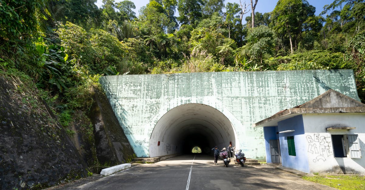 How long do eggs last outside the refrigerator and out of the shell? - Asphalt roadway leading to shabby long tunnel located near old structure and lush green trees in suburb area of countryside How long do eggs last outside the refrigerator and out of the shell? - Asphalt roadway leading to shabby long tunnel located near old structure and lush green trees in suburb area of countryside