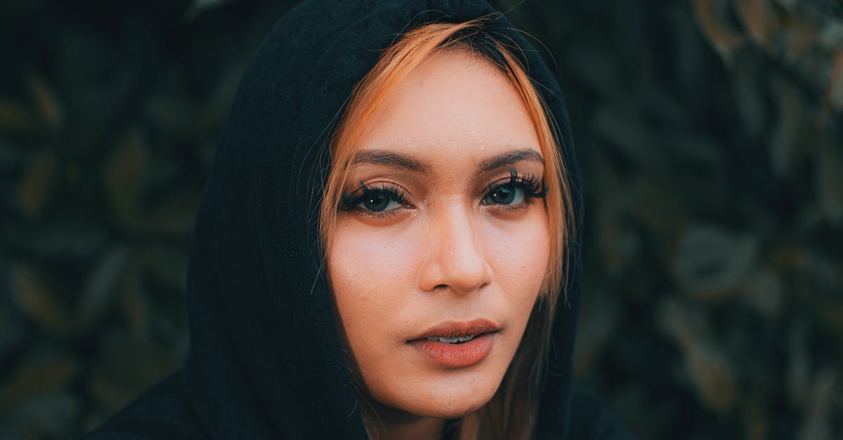How long does ginger root last? - Young attentive female with long eyelashes and red hair looking at camera in garden How long does ginger root last? - Young attentive female with long eyelashes and red hair looking at camera in garden