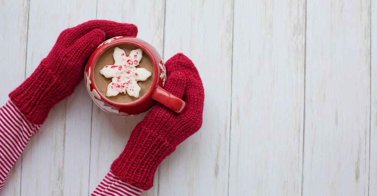 How long does it take a hot oven to become cold [closed] - Person Wearing Red Gloves Holding Red and White Ceramic Mug