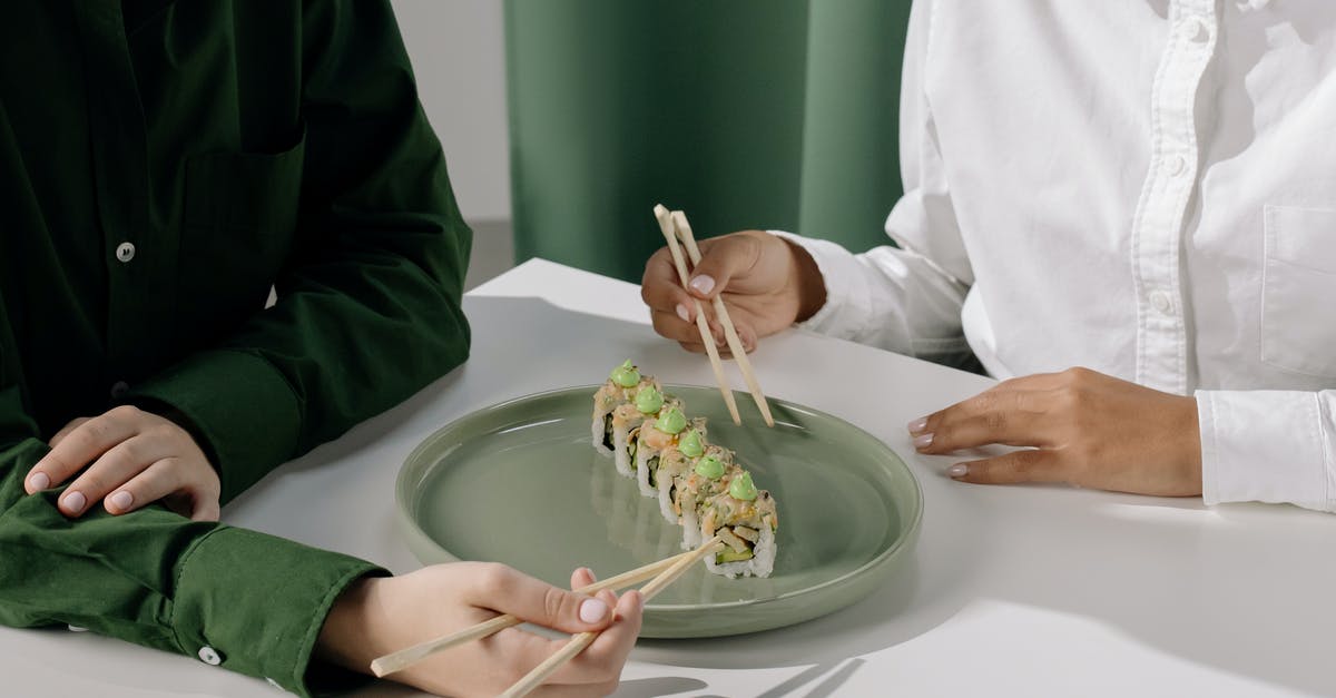 How long in fridge for sushi steaks? - People Wearing Long Sleeves Holding Wooden Chopsticks How long in fridge for sushi steaks? - People Wearing Long Sleeves Holding Wooden Chopsticks