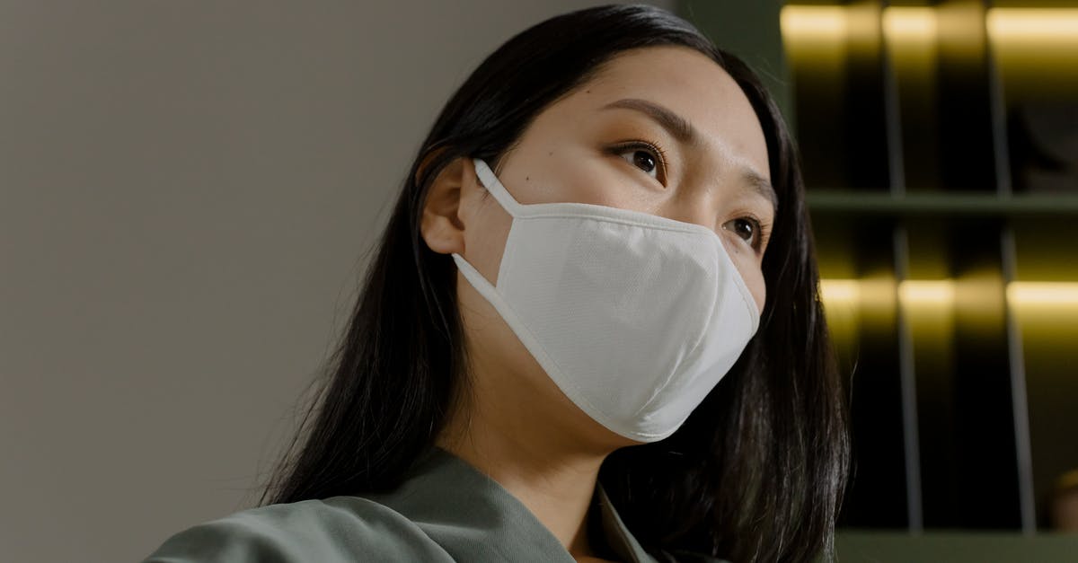 How long is it safe to marinate meat? - African American woman in mask outside in pandemic How long is it safe to marinate meat? - African American woman in mask outside in pandemic