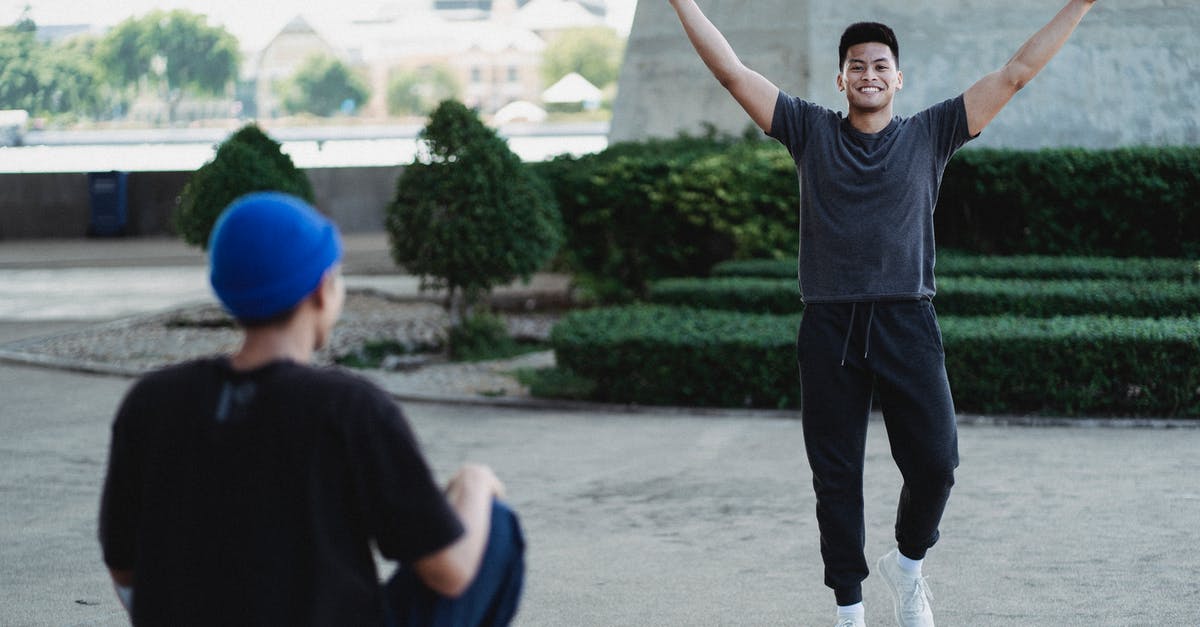 How long is Miso Paste good for in the fridge after opening? [duplicate] - Happy smiling Asian man raising arms in satisfaction while spending sunny day outside with friend and looking at camera