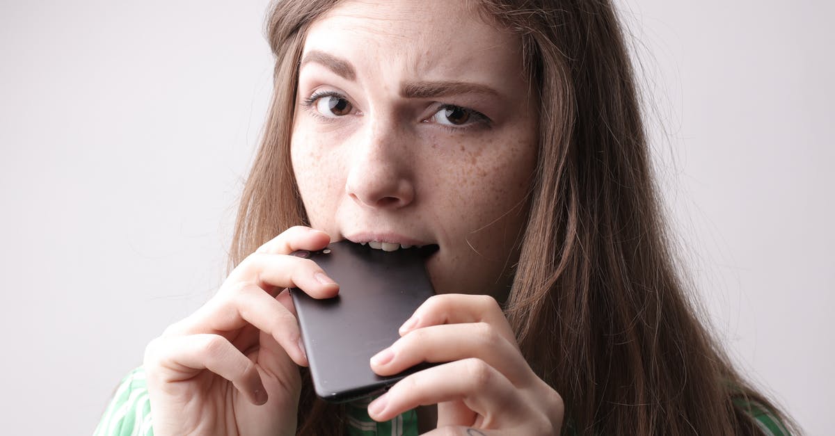 How long should I let a tea with lemongrass steep? - Nervous young female in casual clothing standing with cellphone in mouth after unpleasant phone call on gray background in studio How long should I let a tea with lemongrass steep? - Nervous young female in casual clothing standing with cellphone in mouth after unpleasant phone call on gray background in studio