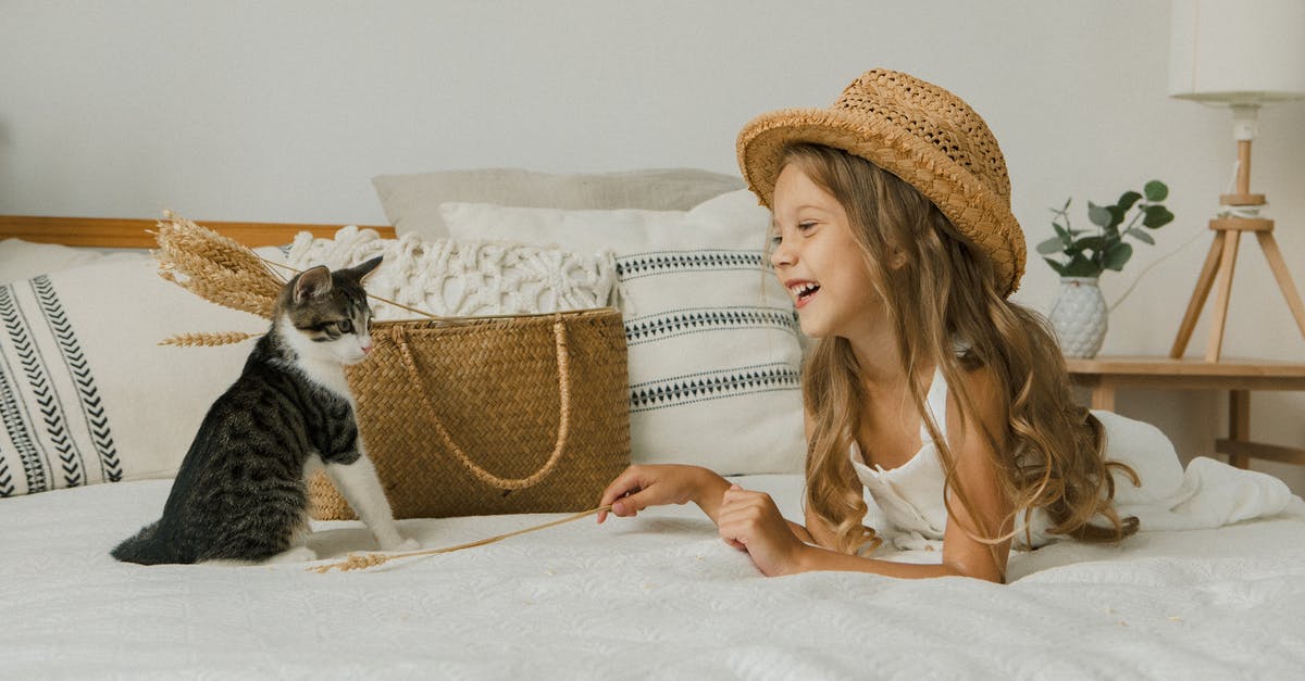 How long should I let durian ripen in a freezer bag? - Photo of a Cat and Girl in a Hat Lying on Bed How long should I let durian ripen in a freezer bag? - Photo of a Cat and Girl in a Hat Lying on Bed