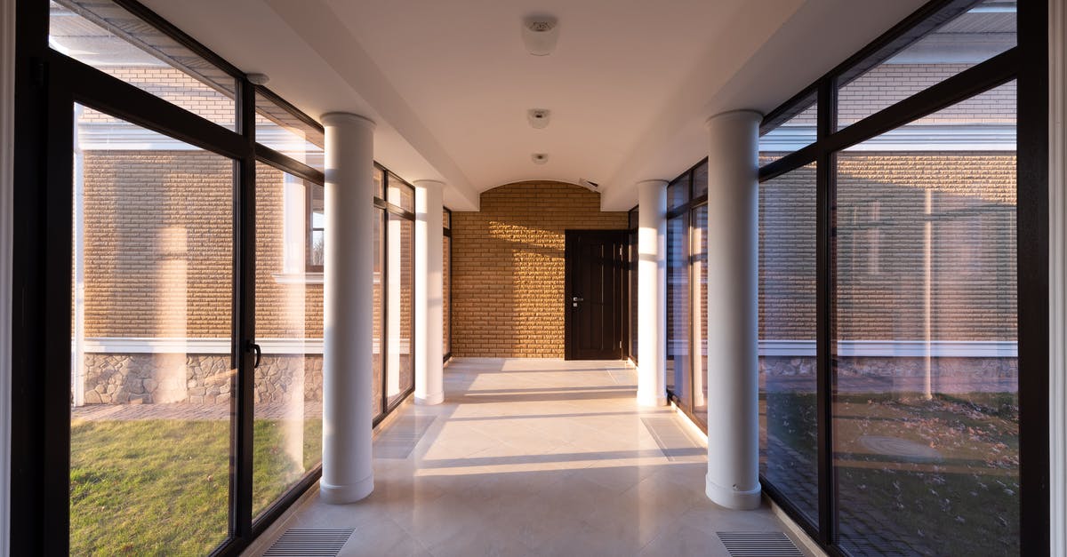 How long should I wait until I put new jars in? - Corridor of modern building with glass walls How long should I wait until I put new jars in? - Corridor of modern building with glass walls