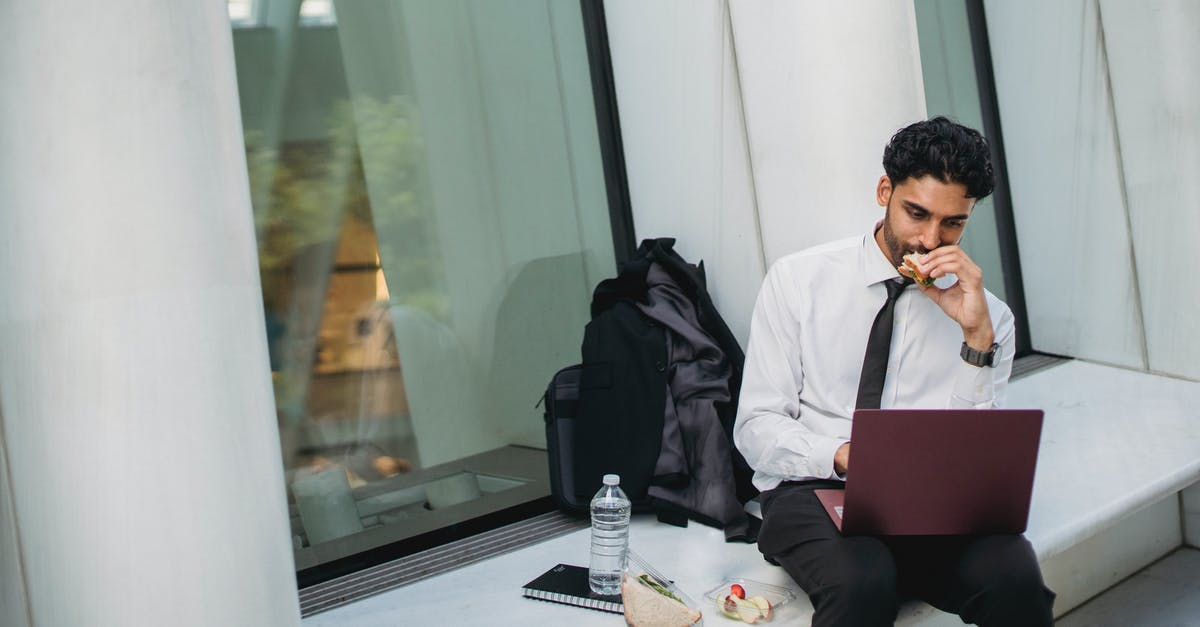 How long will a peanut butter sandwich last? -
A Bearded Man in a Corporate Attire Eating while Using His Laptop How long will a peanut butter sandwich last? -
A Bearded Man in a Corporate Attire Eating while Using His Laptop