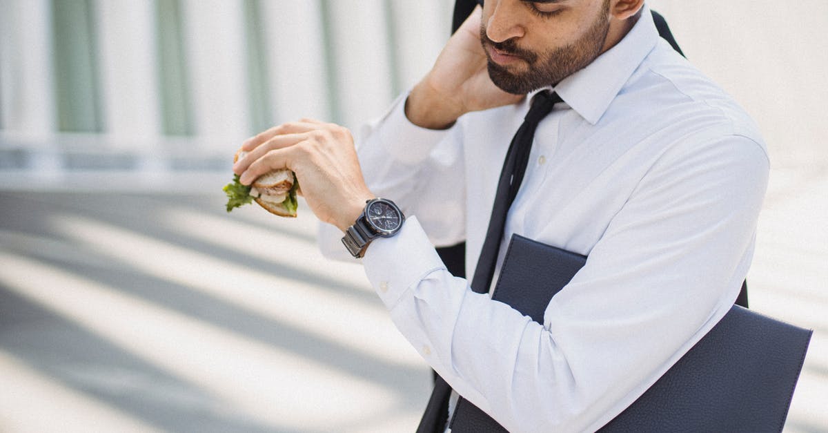How long will a peanut butter sandwich last? -
A Bearded Man in a Corporate Attire Looking at His Watch while Holding a Sandwich How long will a peanut butter sandwich last? -
A Bearded Man in a Corporate Attire Looking at His Watch while Holding a Sandwich