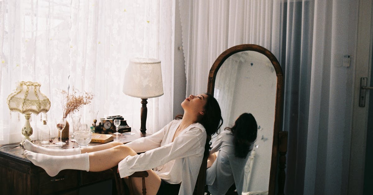 How long would you keep this Caesar dressing? - Girl in Bedroom Sitting in Chair with Legs on Backrest