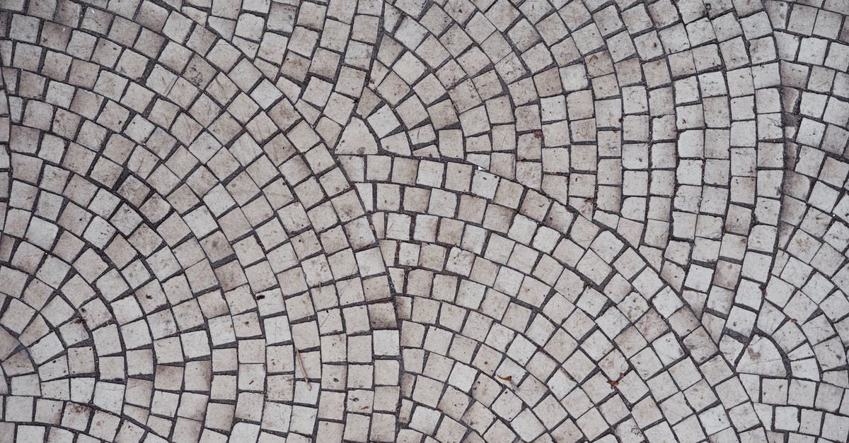 How many ceramic knives do I want? - Mosaic old gray ceramic tile with round pattern How many ceramic knives do I want? - Mosaic old gray ceramic tile with round pattern