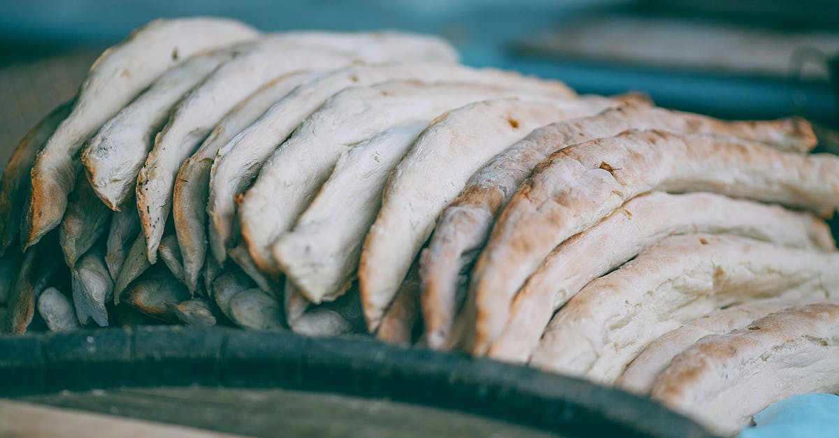 How many risings for bread? - High angle of fresh delicious baked traditional Georgian shoti bread in heap in bakery How many risings for bread? - High angle of fresh delicious baked traditional Georgian shoti bread in heap in bakery