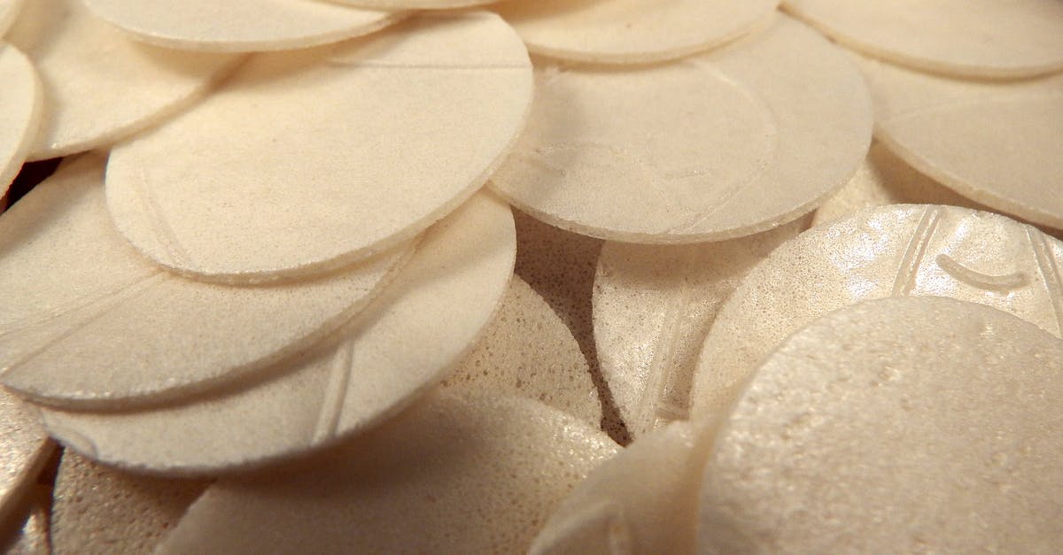 How many risings for bread? - Pile of thin white circles of Sacramental bread How many risings for bread? - Pile of thin white circles of Sacramental bread