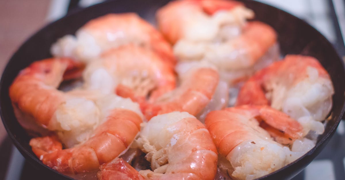 How might these prawns have been cooked? - Shrimp on Black Pan How might these prawns have been cooked? - Shrimp on Black Pan