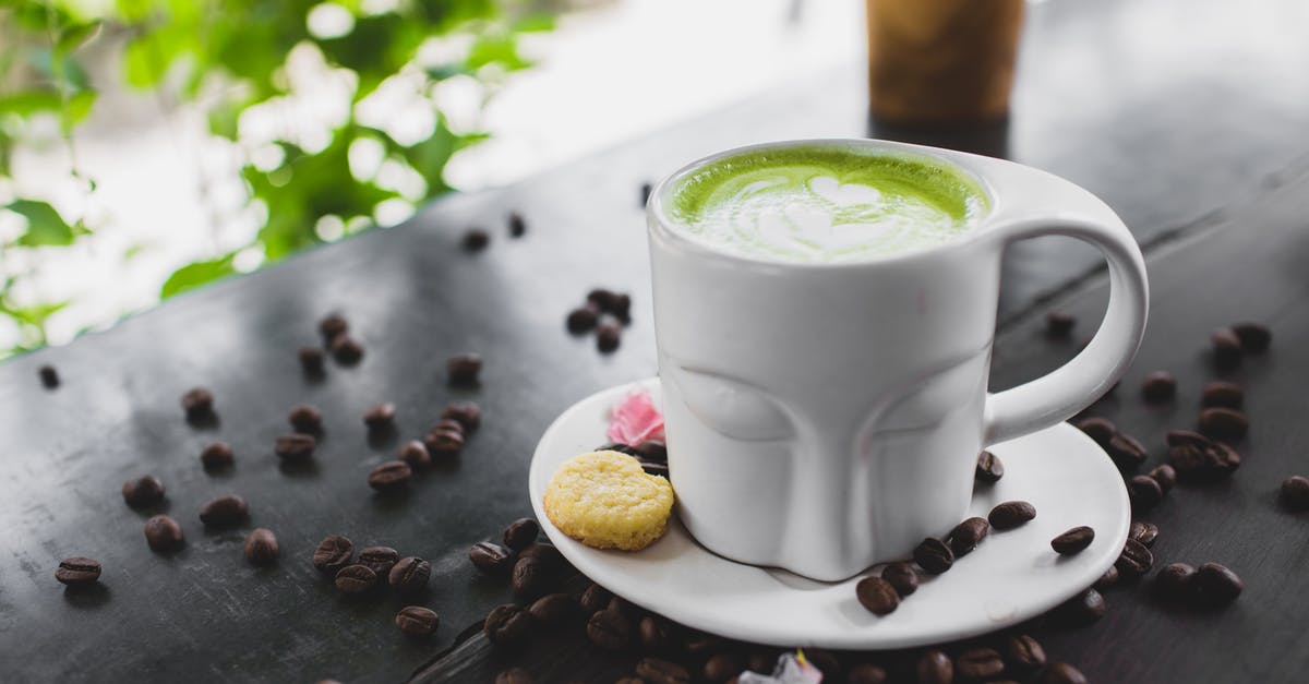 How much caffeine is in matcha powder? - Close-Up Photo of Matcha Latte on a Ceramic Cup How much caffeine is in matcha powder? - Close-Up Photo of Matcha Latte on a Ceramic Cup