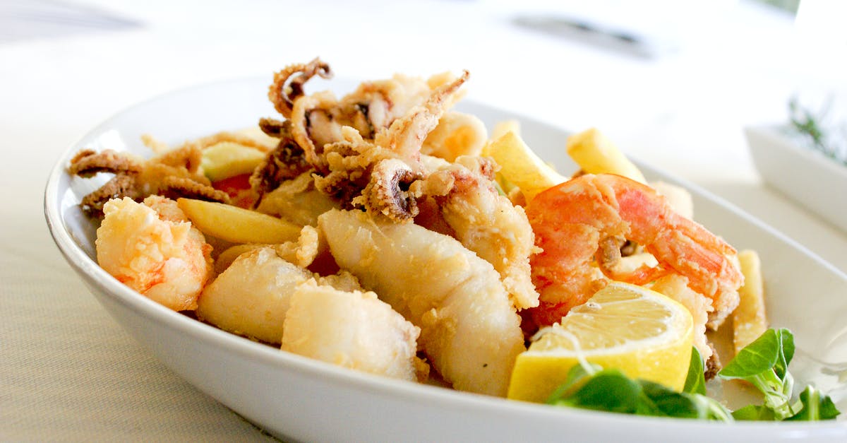 How much of a shrimp is meat? - Deep Fried Shrimp and Squid With Slice of Lemon on Ceramic Plate