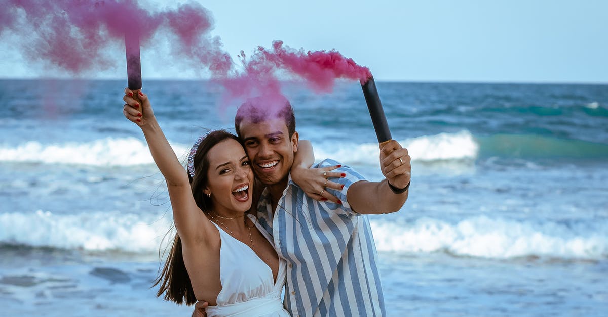 How much smoke to expect from making a roux? - Happy pregnant couple with pink smoke bombs How much smoke to expect from making a roux? - Happy pregnant couple with pink smoke bombs